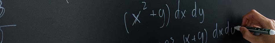 Image of Chalkboard, books, pencils in a cup and an apple.